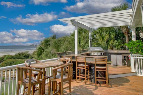 Outdoor kitchen and seating on the deck.