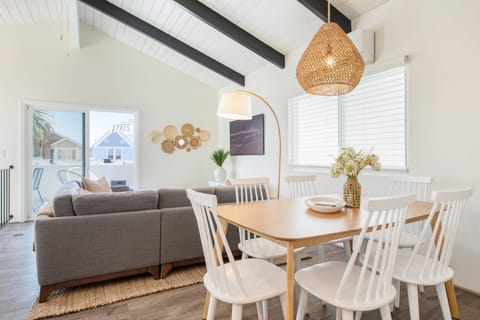 Open layout connects the living room and dining area.