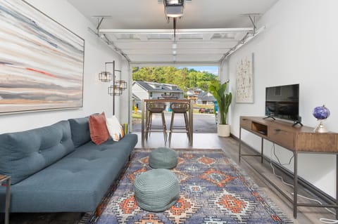 Converted garage lounge at Willow offers a futon for more sleeping space.