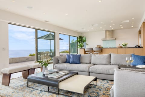 Airy living room with huge windows for tons of natural light and San Diego views.