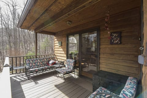 Unwind in style on the front deck's cozy couch.