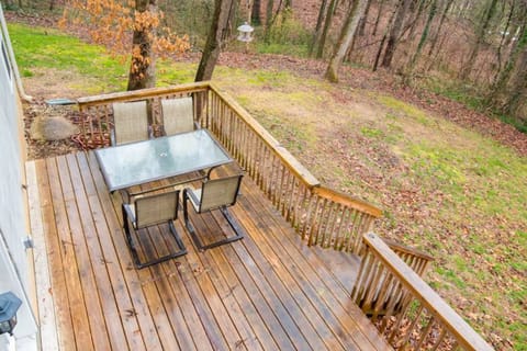 Step outside and embrace nature on the lower deck, your gateway to the backyard bliss.