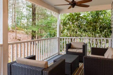 Enjoy the outdoors in this front porch seating area.