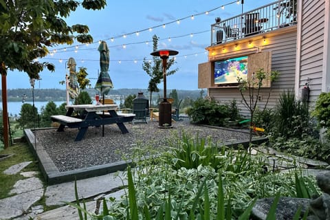 Vibey lounge area with an outdoor TV.