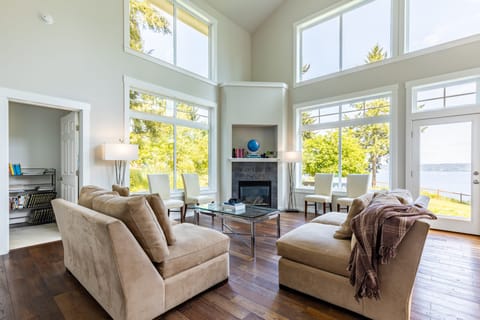 Gleaming with hardwood floors and a cozy fireplace.