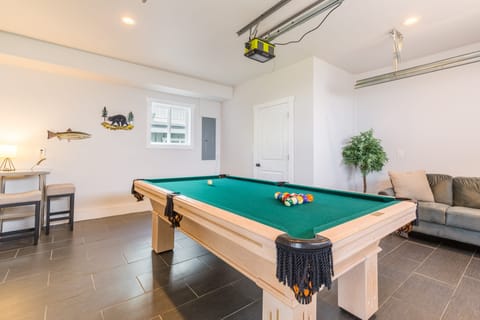 Cue in hand, ready to sink some balls.