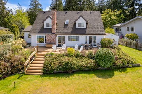 Charming, 2,900 sq. ft. waterfront home perched on 82' high bank.