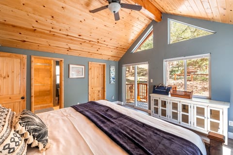 Tons of natural light and tall ceilings in the primary bedroom.