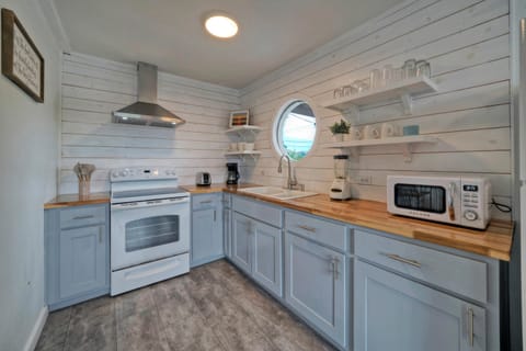 This kitchen is as refreshing as a clear summer day.