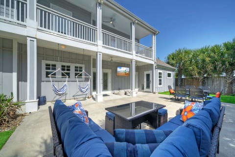 Outdoor oasis: couch and hammock.