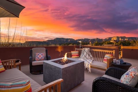 Expansive rooftop deck offering stunning panoramas of Sedona's renowned red rock formations.