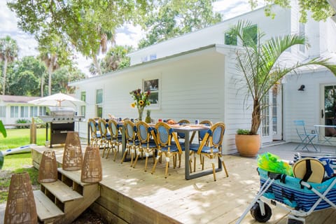 Jessamine offers a charming backyard deck with al fresco dining and cornhole.