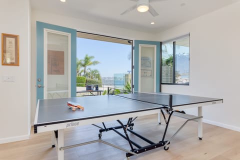 Plenty of ways to play, including a ping pong table next to breezy French doors.