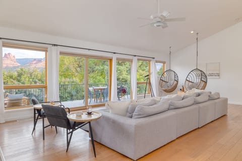 Large picture windows in the common area with unique swing seating.