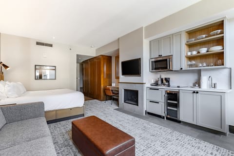 Comfortable King bed with seating space.