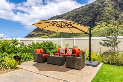 Shaded outdoor lounge perfect for enjoying the tropical mountain views.