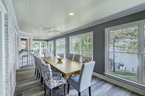 Dining table in the Sun Room - seating for 8-10. Just steps from the kitchen.