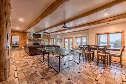 Lower level game room - complete with shuffle board, skeeball, and ping pong.