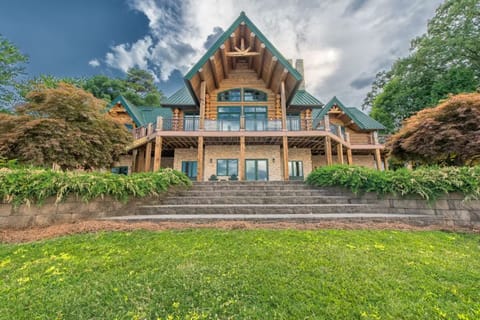 The back of Azalea Retreat-The Lodge - stone steps down to the lake, decks galore!