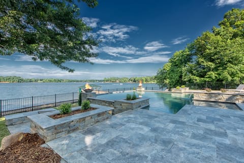 Luxurious pool overlooking the lake.