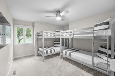 Bunk room features two twin bunk beds.