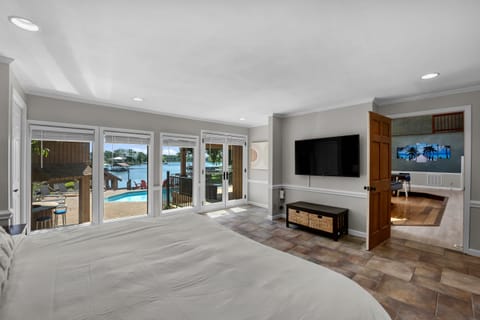 Master Bedroom - main level - king bed, amazing views of the lake & full attached bathroom.