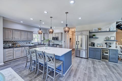 Renovated kitchen with new cabinets, appliances & island.