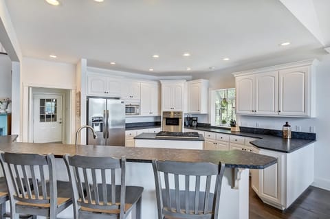 Kitchen with bar seating for 4.