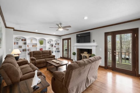 A symphony of literature and coziness in our living area.