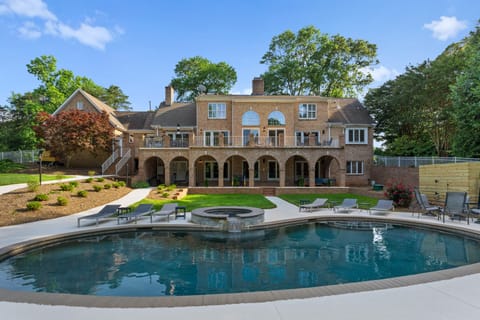 Large backyard with swimming pool and hot tub!