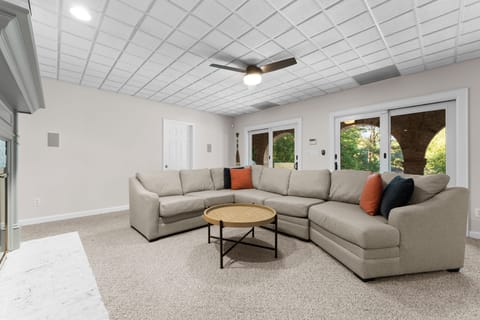 Lower Level Recreation room with a pool table and bar.