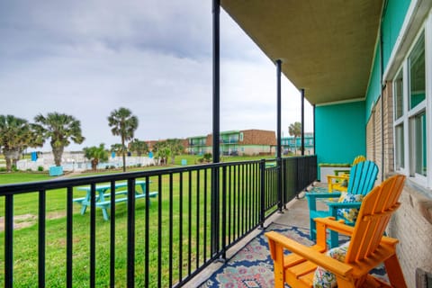 Covered patio with pool and ocean views.