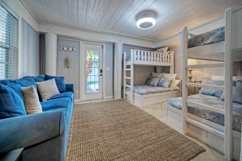 Convenient bunk room with a sleeper sofa is perfect for families with kids or groups of friends.