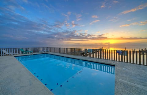 Corpus Christi oasis features a community pool on the water's edge.