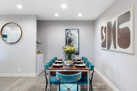 Experience culinary bliss and dine in style in this stunningly designed  kitchen/dining area.