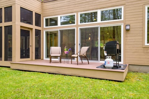 Step onto your spacious deck with comfortable seating and a BBQ grill.