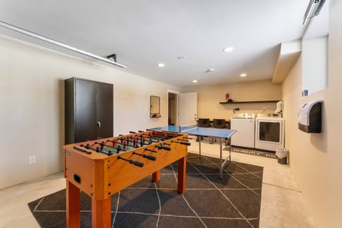 Game room with ping pong and foosball.