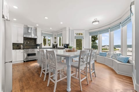 Fully stocked kitchen with large island seating for 6.