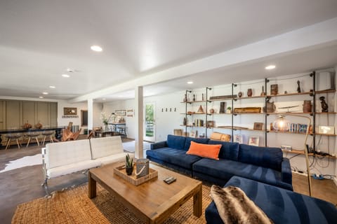 The barn offers a second spacious living area to relax and connect.