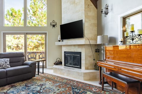 Grand fireplace in the living area.
