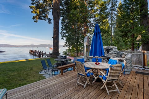 Spacious deck with an outdoor dining area.