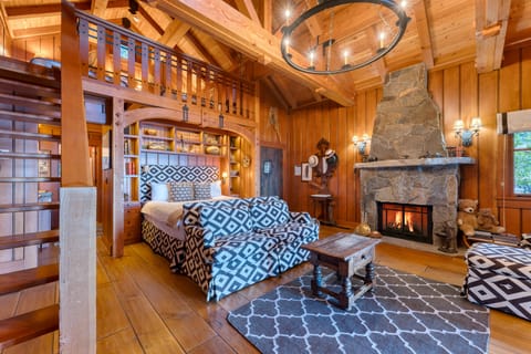 Fireplace and seating area in Bedroom 1.