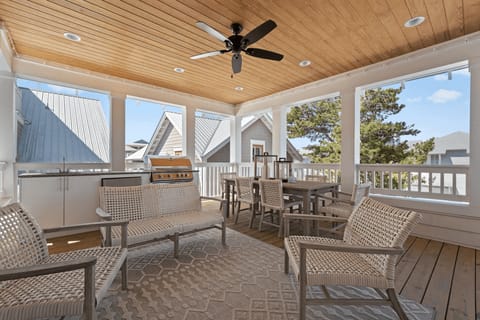 Covered lanai for sunset views and cocktails.