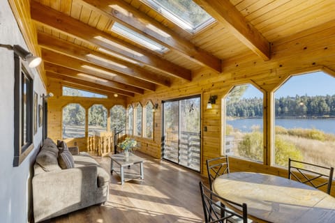 Breathtaking lake views framed by soaring windows.