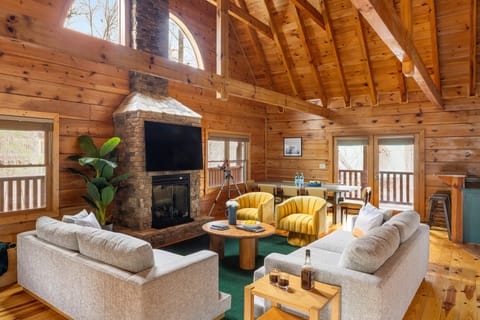 Cozy up by the stone fireplace.