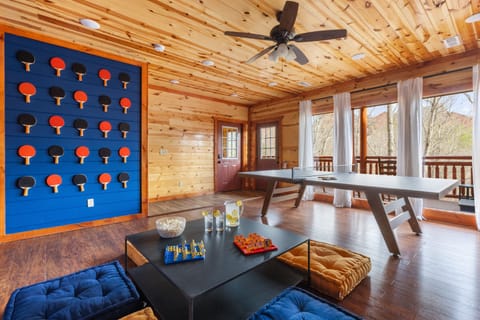 The game room with incredible views and deck access.