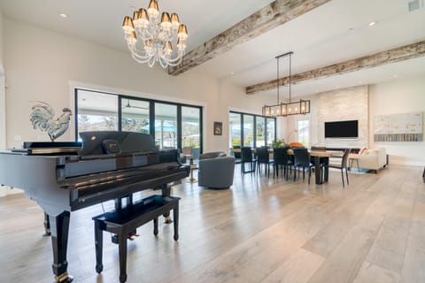 Gorgeous great room with a baby grand piano.