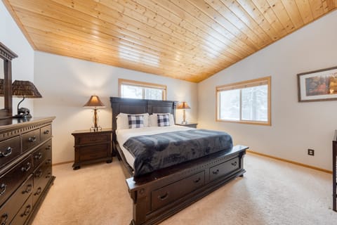 The primary bedroom features a king bed, ensuite bathroom.