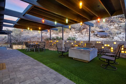 Relax on the large covered patio, offering plenty of shade and space for outdoor lounging and dining!