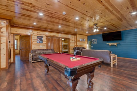 The game room also offers easy access to the balcony.